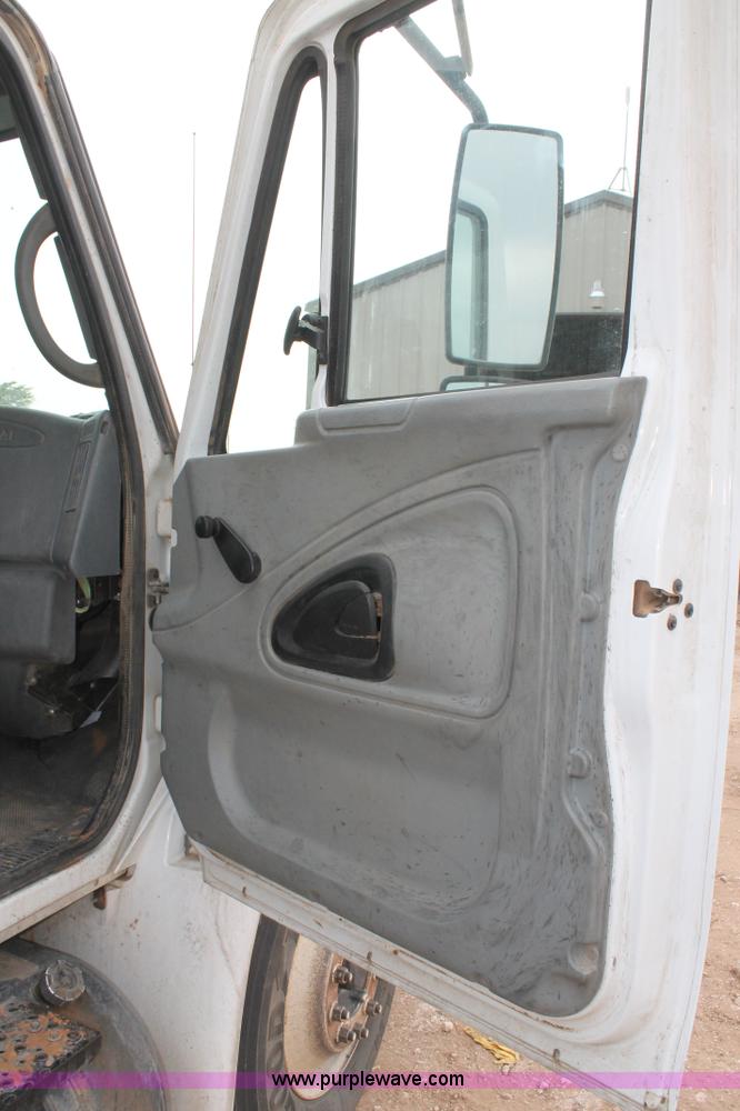 image for item C3934 2003 International DuraStar 4300 flatbed truck with crane