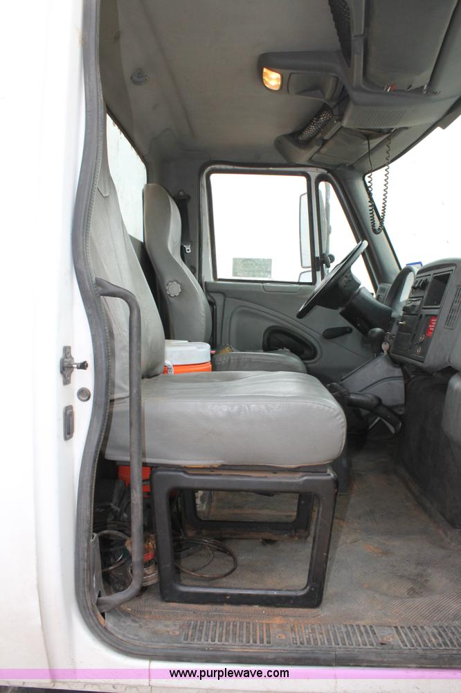 image for item C3934 2003 International DuraStar 4300 flatbed truck with crane