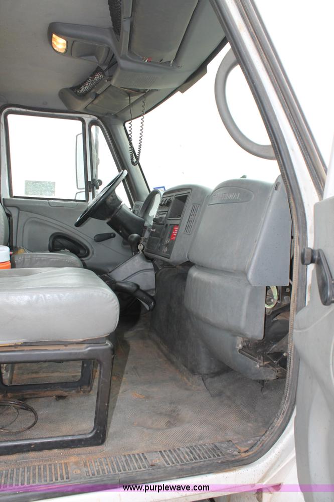 image for item C3934 2003 International DuraStar 4300 flatbed truck with crane