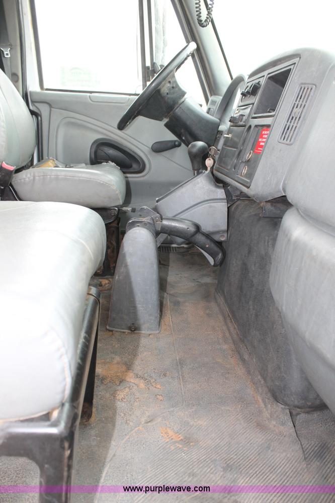 image for item C3934 2003 International DuraStar 4300 flatbed truck with crane