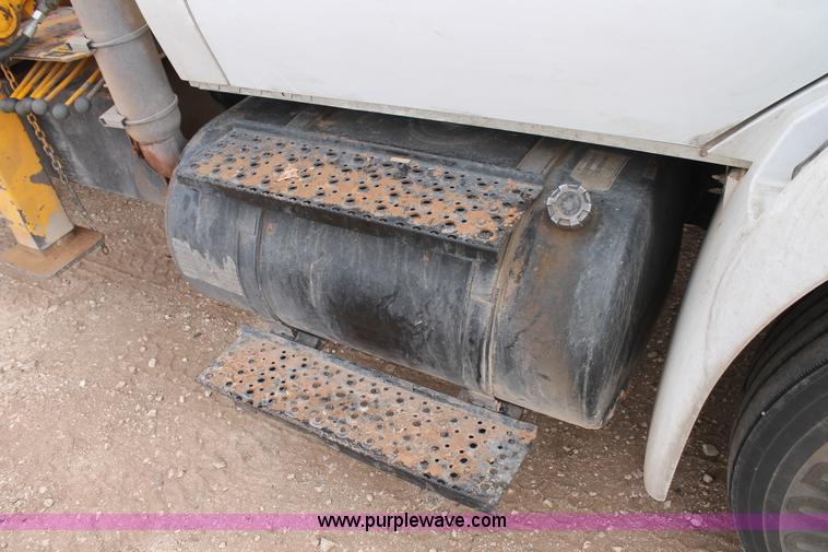 image for item C3934 2003 International DuraStar 4300 flatbed truck with crane