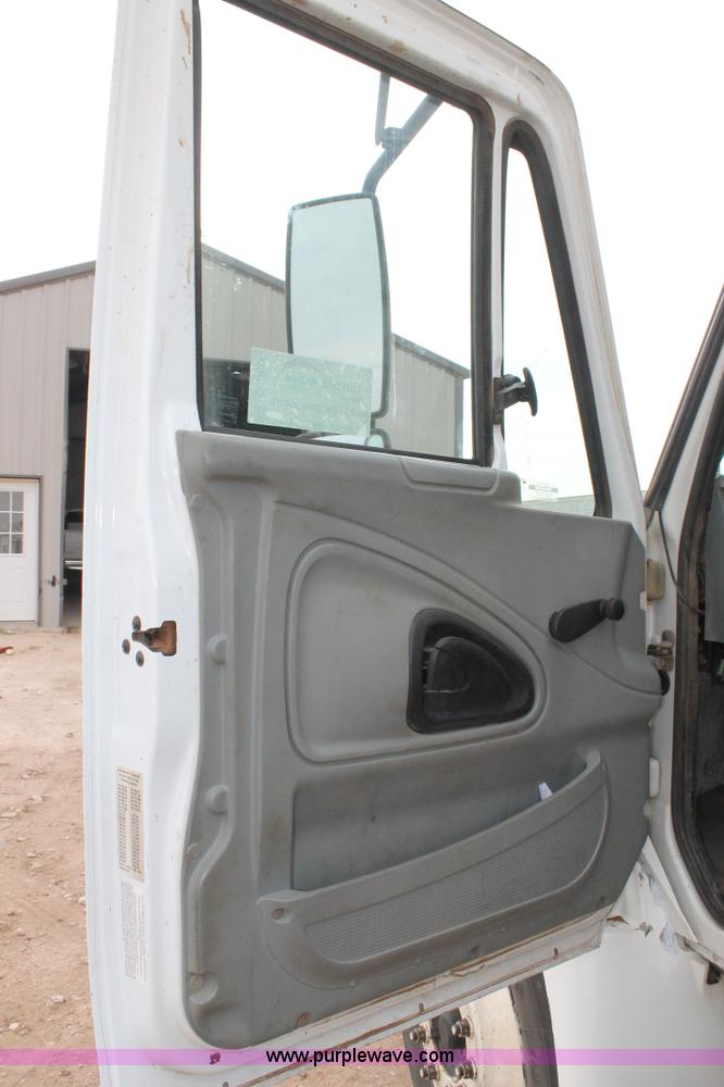 image for item C3934 2003 International DuraStar 4300 flatbed truck with crane