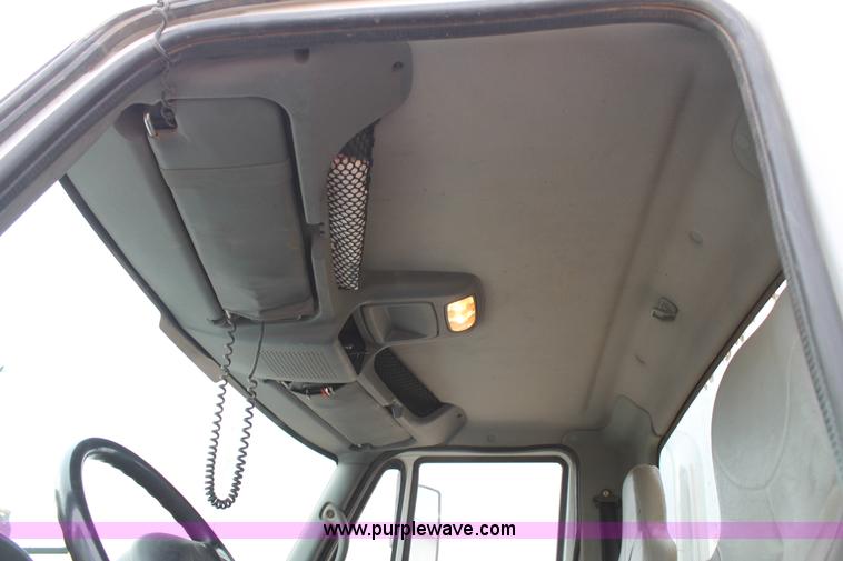 image for item C3934 2003 International DuraStar 4300 flatbed truck with crane