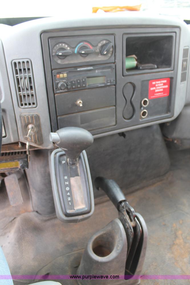 image for item C3934 2003 International DuraStar 4300 flatbed truck with crane