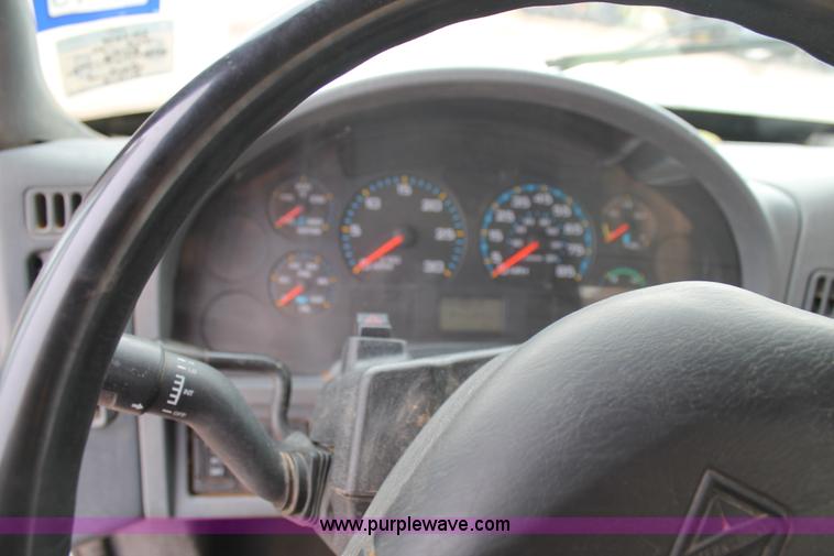 image for item C3934 2003 International DuraStar 4300 flatbed truck with crane