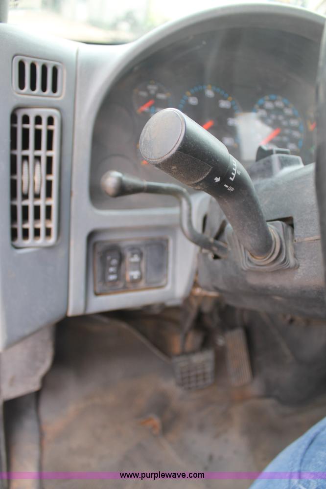 image for item C3934 2003 International DuraStar 4300 flatbed truck with crane