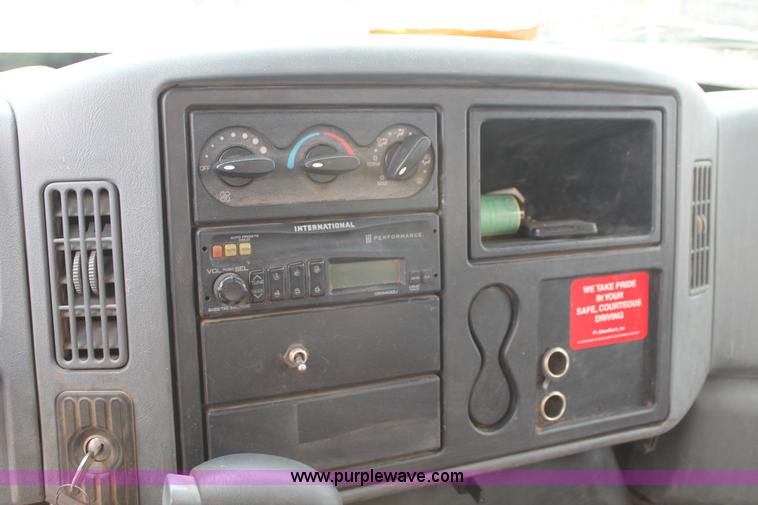 image for item C3934 2003 International DuraStar 4300 flatbed truck with crane