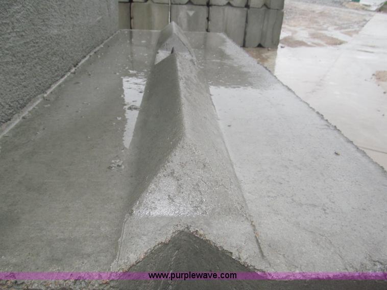 image for item D1061 (16) 6'L x 2'W x 2'H concrete bunker blocks