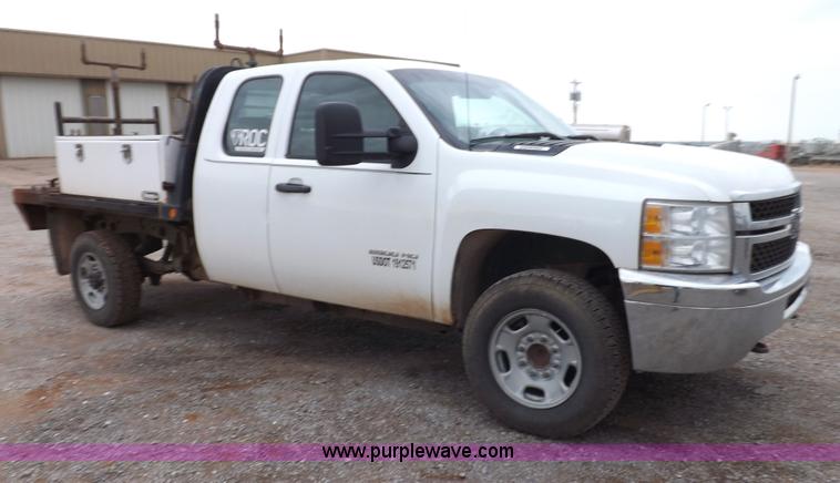 image for item H1754 2011 Chevrolet Silverado 2500HD Ext. Cab flatbed truck