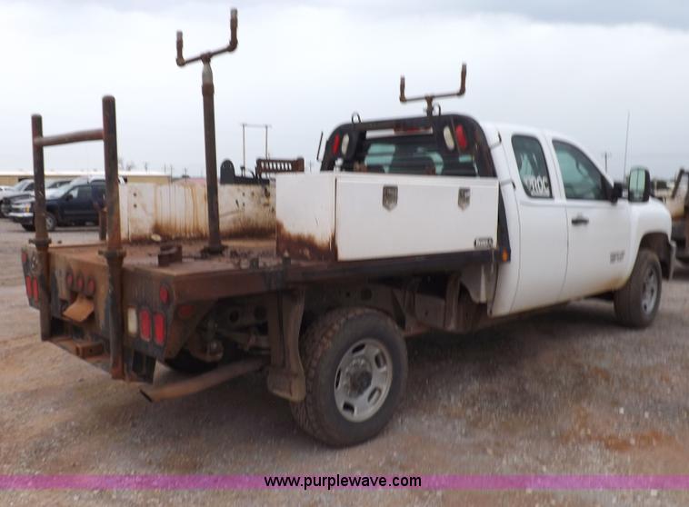 image for item H1754 2011 Chevrolet Silverado 2500HD Ext. Cab flatbed truck
