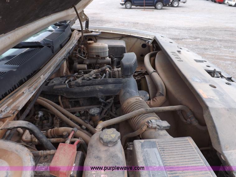 image for item H1754 2011 Chevrolet Silverado 2500HD Ext. Cab flatbed truck