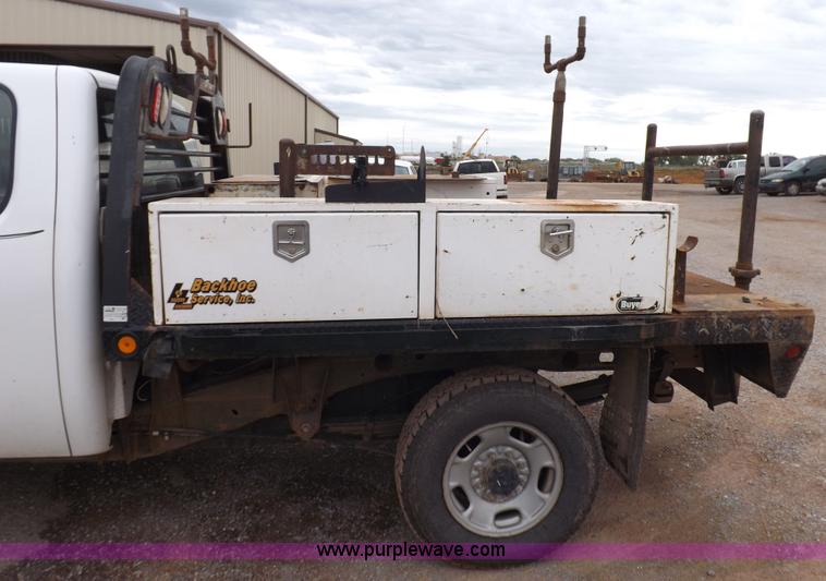 image for item H1754 2011 Chevrolet Silverado 2500HD Ext. Cab flatbed truck