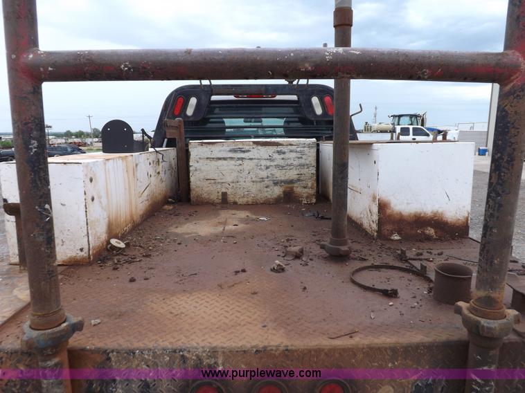 image for item H1754 2011 Chevrolet Silverado 2500HD Ext. Cab flatbed truck