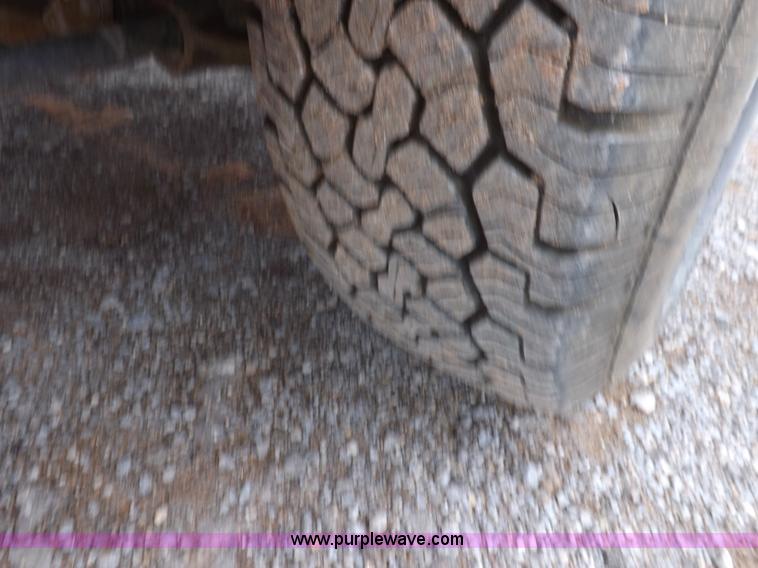 image for item H1754 2011 Chevrolet Silverado 2500HD Ext. Cab flatbed truck