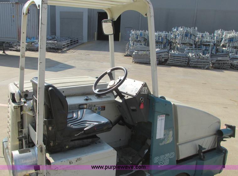 image for item I3495 Tennant 6650XS ride-on sweeper