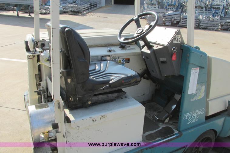 image for item I3495 Tennant 6650XS ride-on sweeper