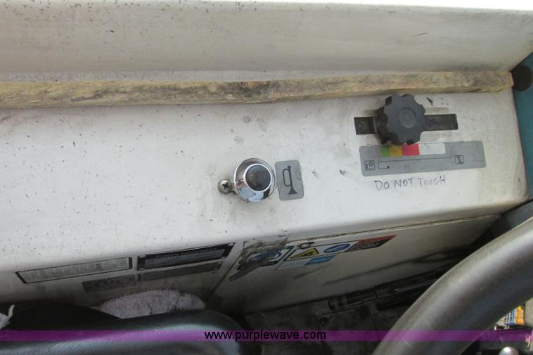 image for item I3495 Tennant 6650XS ride-on sweeper