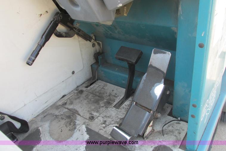 image for item I3495 Tennant 6650XS ride-on sweeper