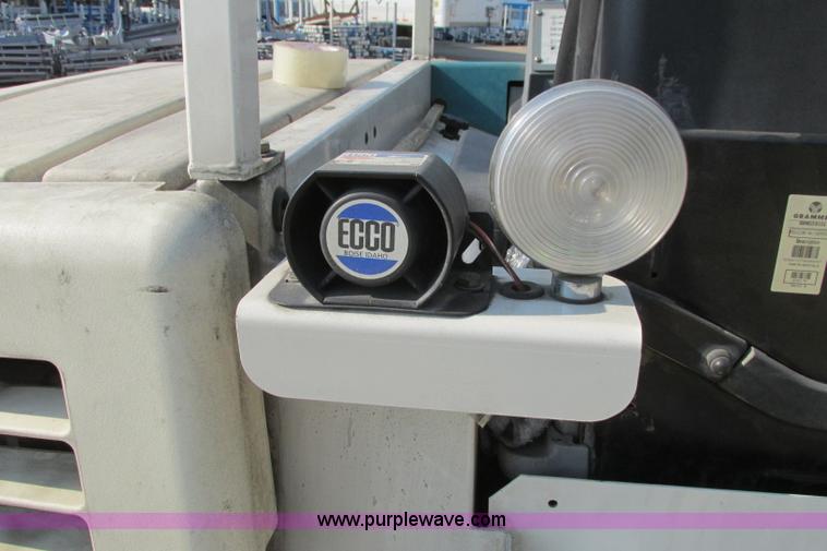 image for item I3495 Tennant 6650XS ride-on sweeper