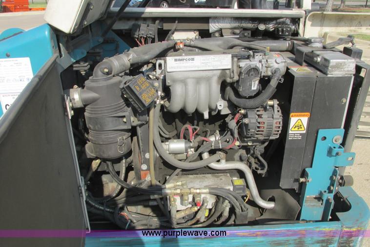 image for item I3495 Tennant 6650XS ride-on sweeper