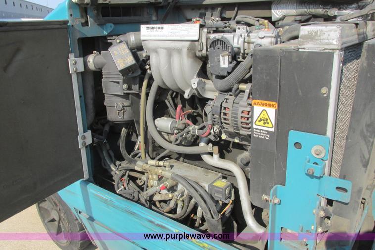 image for item I3495 Tennant 6650XS ride-on sweeper