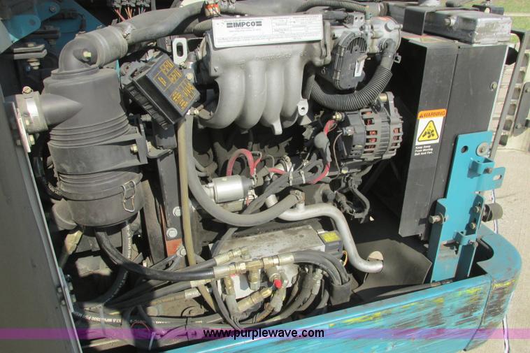 image for item I3495 Tennant 6650XS ride-on sweeper