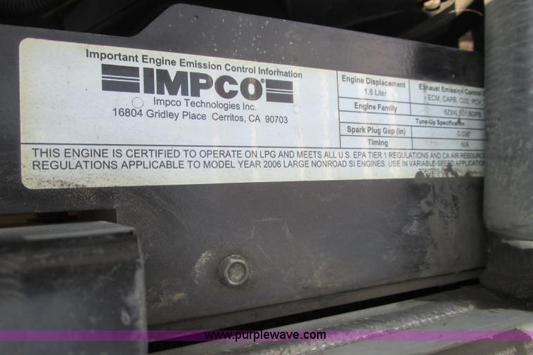 image for item I3495 Tennant 6650XS ride-on sweeper