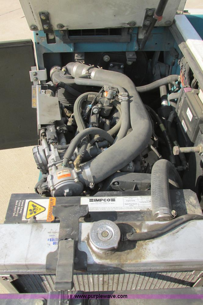 image for item I3495 Tennant 6650XS ride-on sweeper