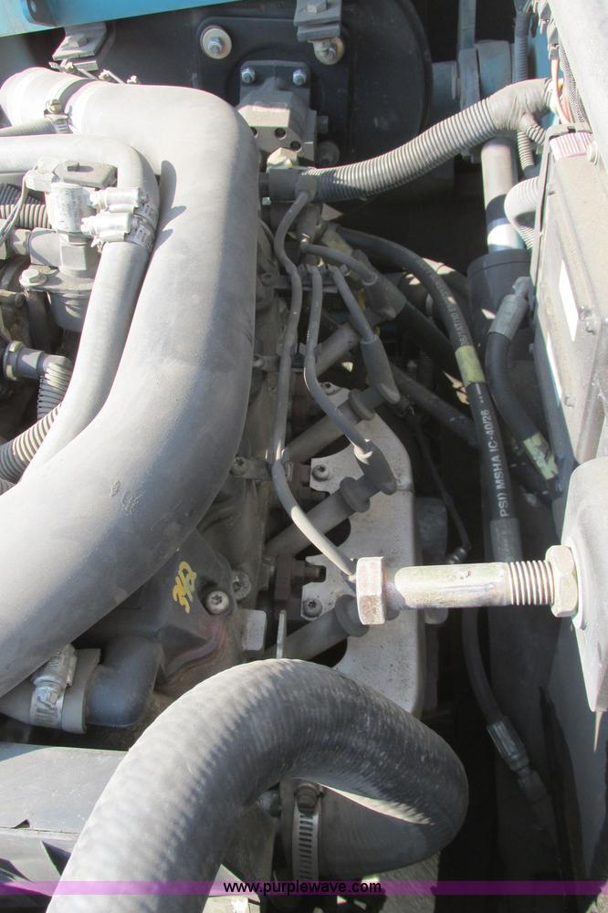 image for item I3495 Tennant 6650XS ride-on sweeper