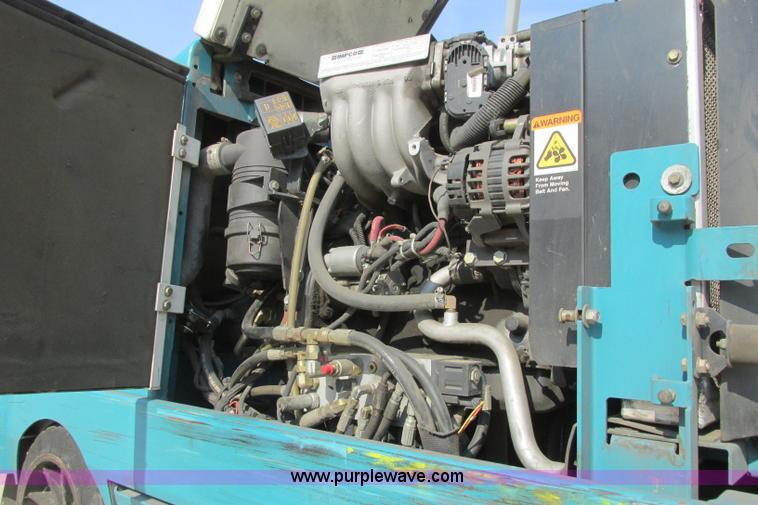 image for item I3495 Tennant 6650XS ride-on sweeper