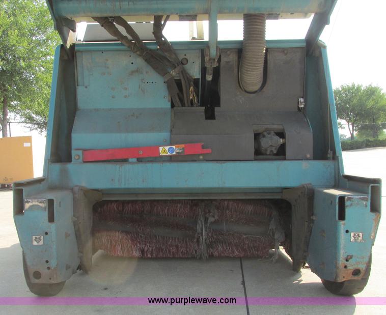 image for item I3495 Tennant 6650XS ride-on sweeper