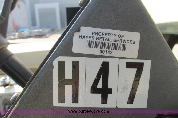 image for item I3495 Tennant 6650XS ride-on sweeper