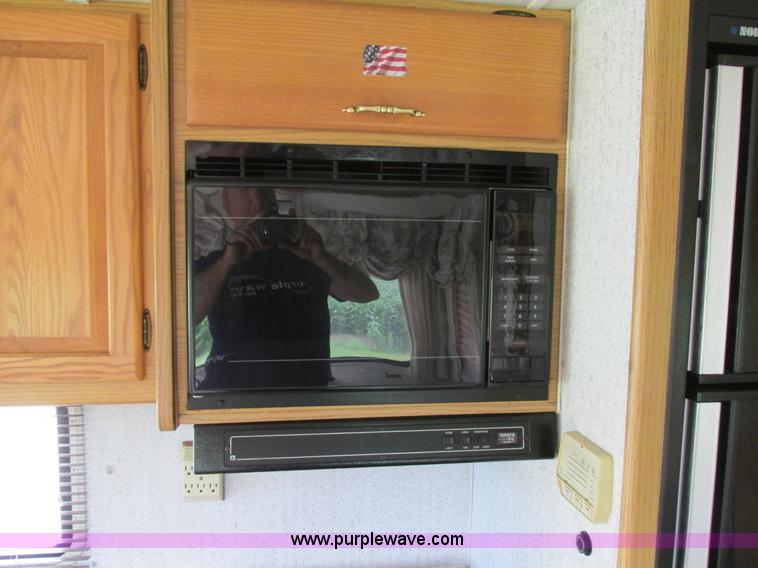 image for item I4146 1995 Winnebago ICG34RQ Itasca camper