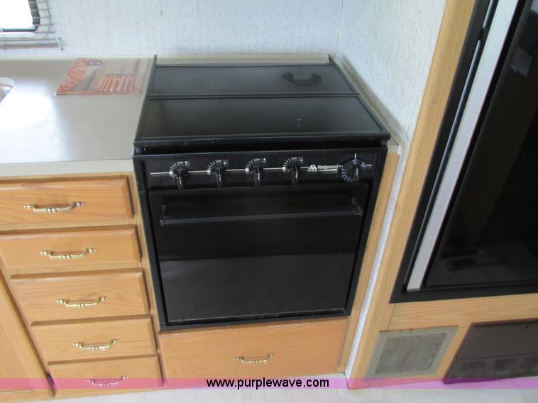 image for item I4146 1995 Winnebago ICG34RQ Itasca camper