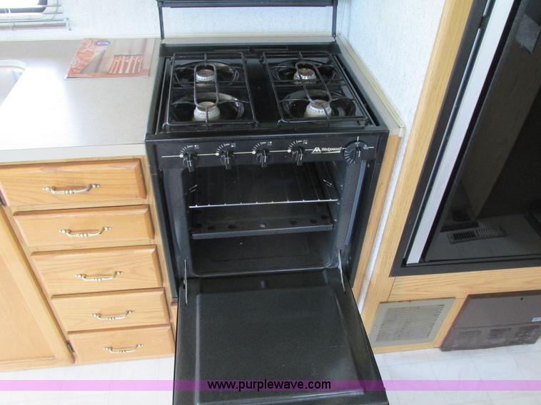 image for item I4146 1995 Winnebago ICG34RQ Itasca camper