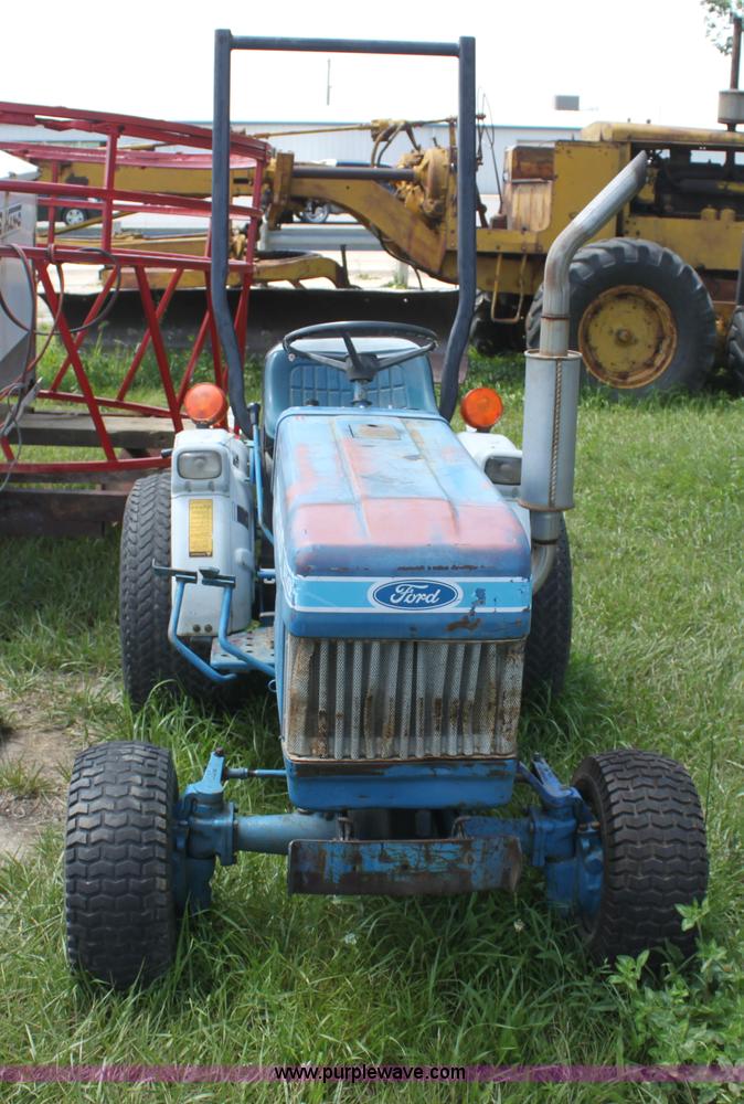 image for item I7348 Ford 1210 MFWD tractor