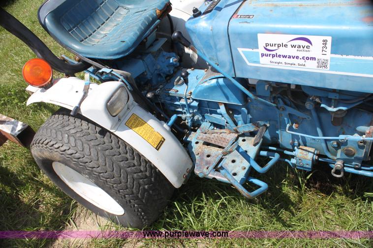 image for item I7348 Ford 1210 MFWD tractor