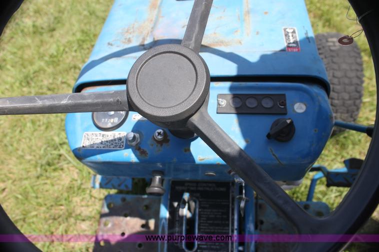 image for item I7348 Ford 1210 MFWD tractor