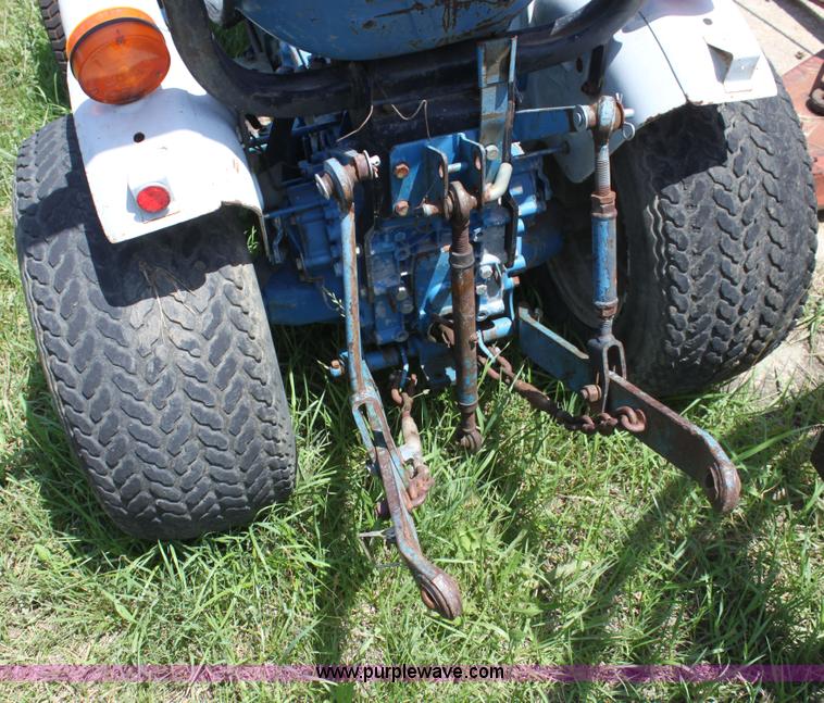 image for item I7348 Ford 1210 MFWD tractor