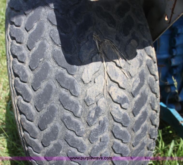 image for item I7348 Ford 1210 MFWD tractor