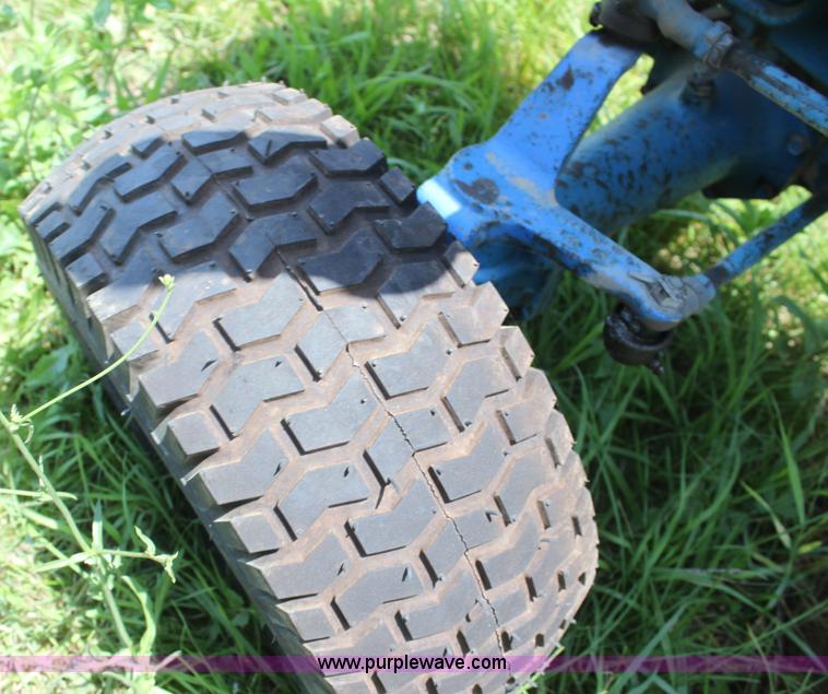 image for item I7348 Ford 1210 MFWD tractor