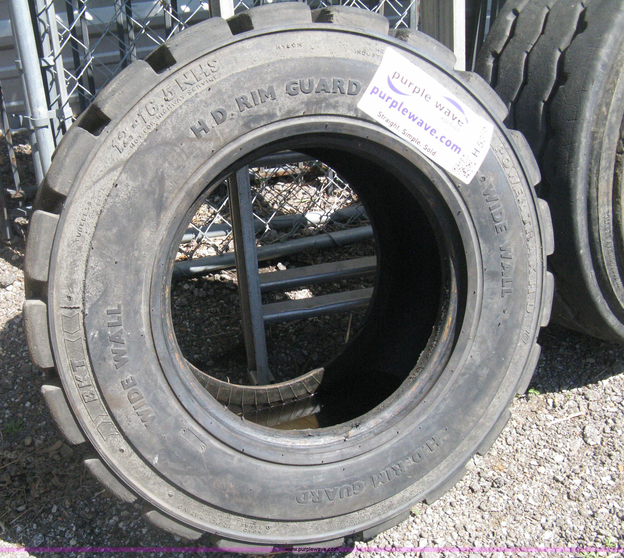 (3) skid steer tires in Wichita, KS Item H5345 sold Purple Wave