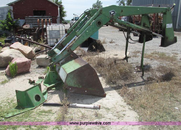 image for item F7445 John Deere 158 tractor loader