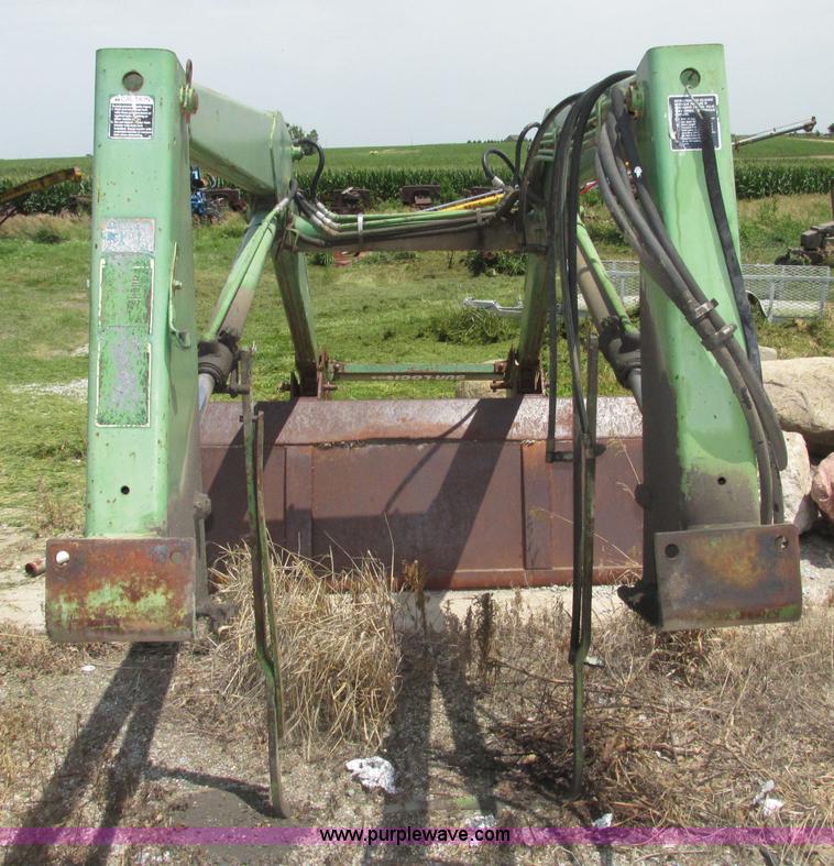 image for item F7445 John Deere 158 tractor loader