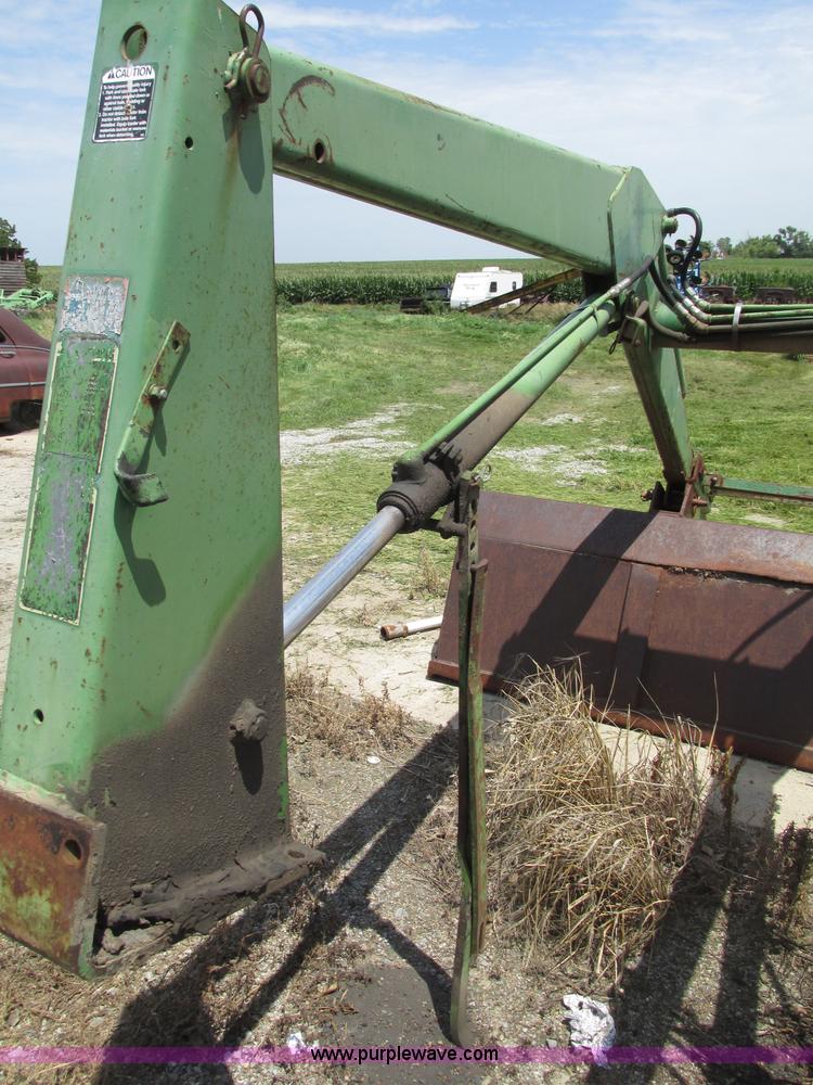 image for item F7445 John Deere 158 tractor loader