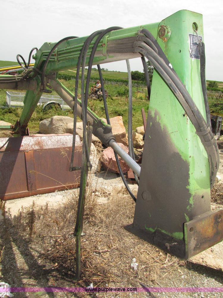 image for item F7445 John Deere 158 tractor loader