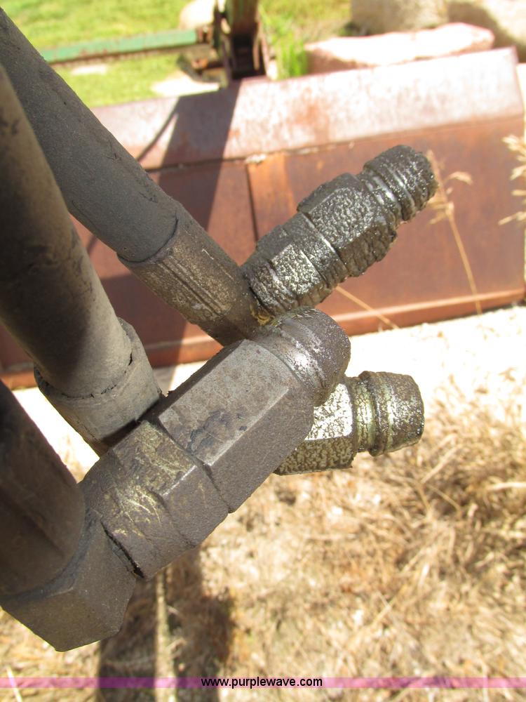 image for item F7445 John Deere 158 tractor loader