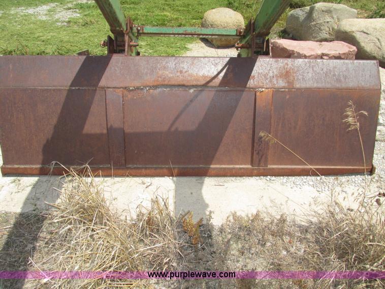 image for item F7445 John Deere 158 tractor loader