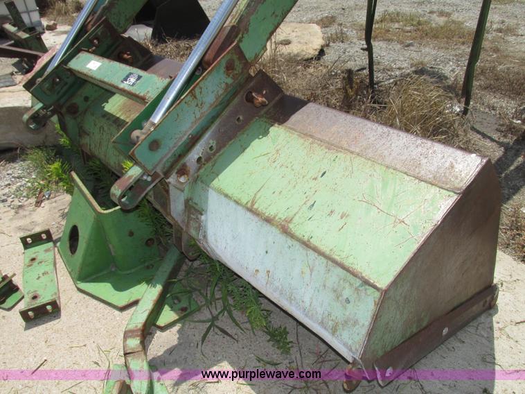 image for item F7445 John Deere 158 tractor loader