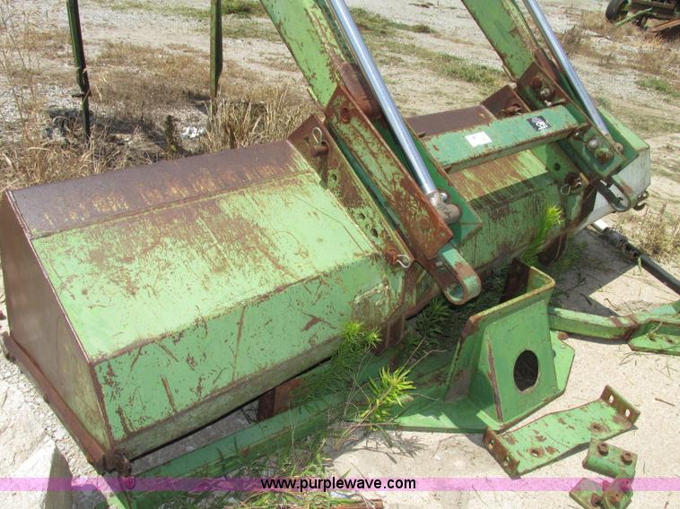 image for item F7445 John Deere 158 tractor loader